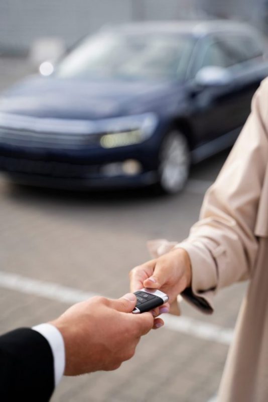 financial independent woman buying new car 1 scaled e1777544474662